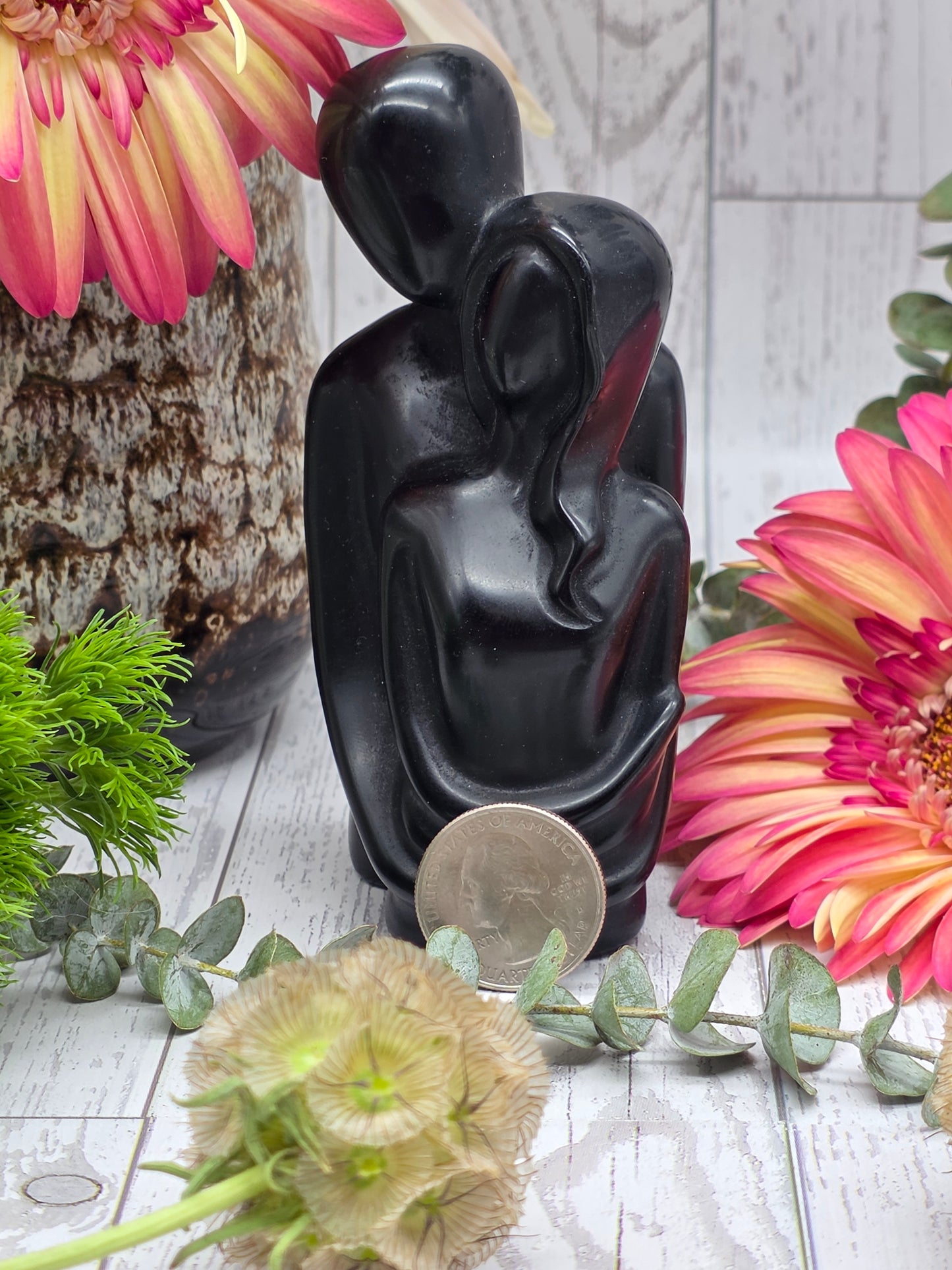 Obsidian Couple Carving