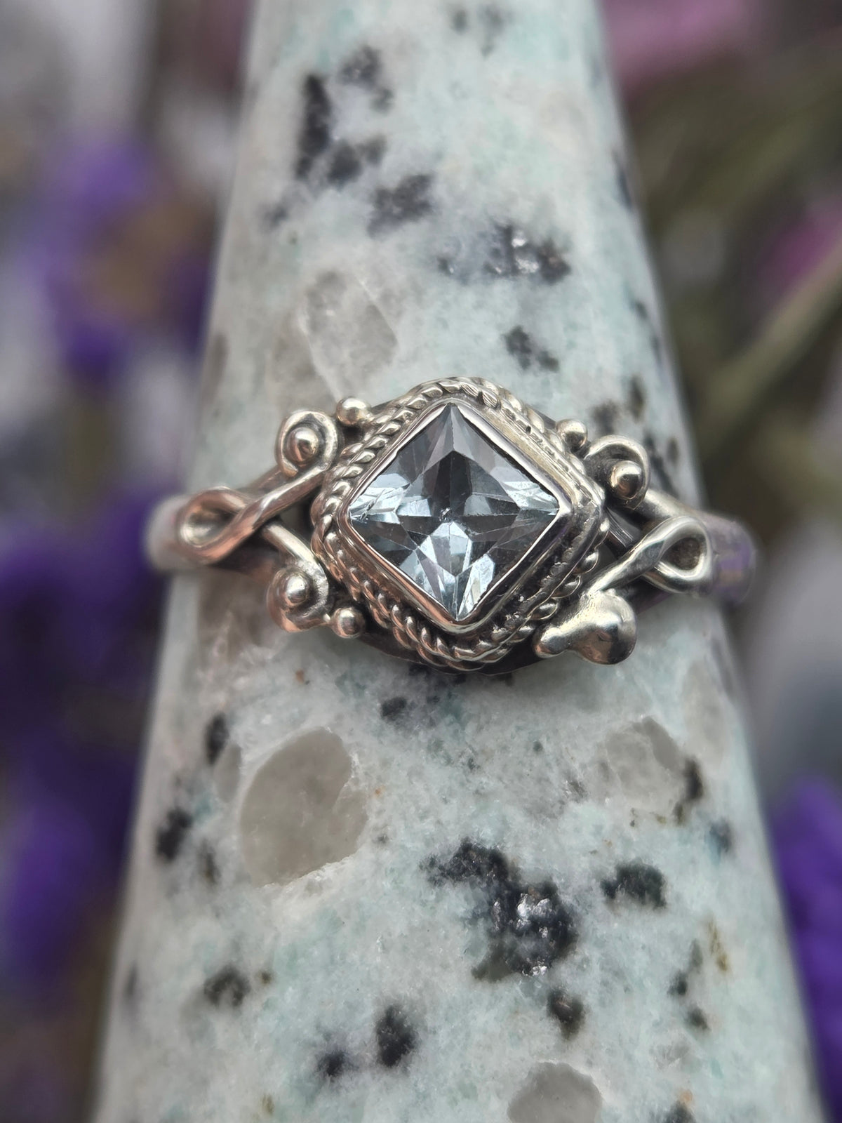 Blue sterling silver ring with intricate design