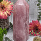 Large rose quartz tower with flowers