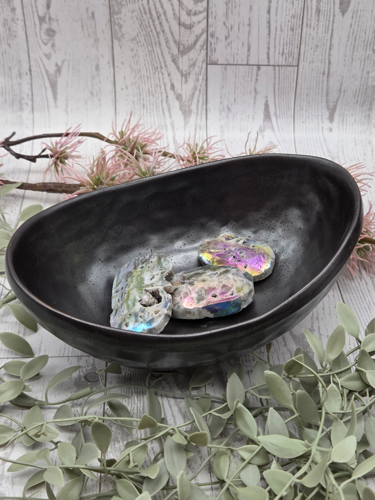 Black ceramic bowl with polished finish