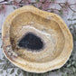 Fossilized bamboo bowl with beige and black coloration