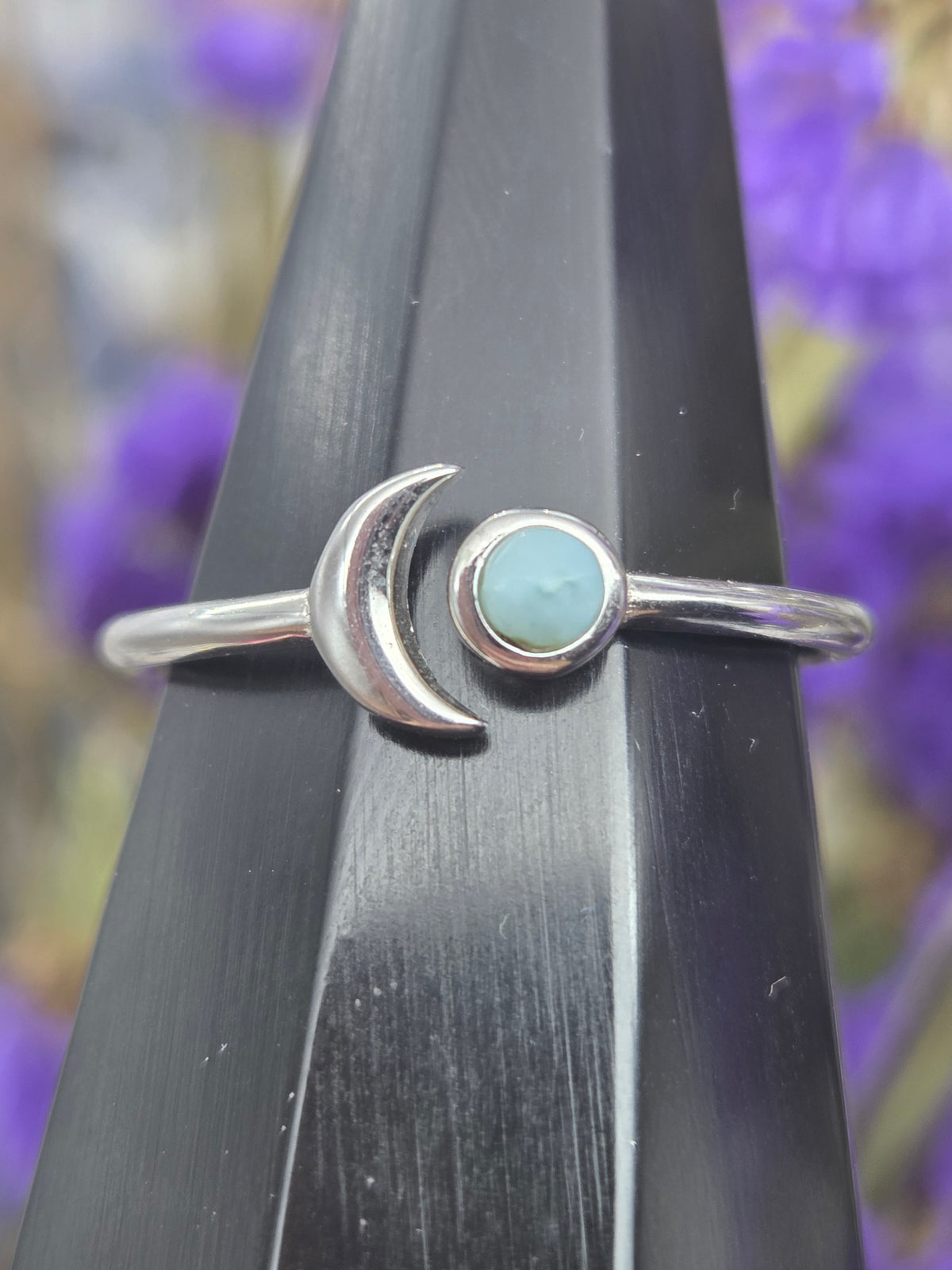 Larimar moon ring with a blue stone and moon motif