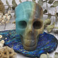 Amazonite skull with blue and brown hues