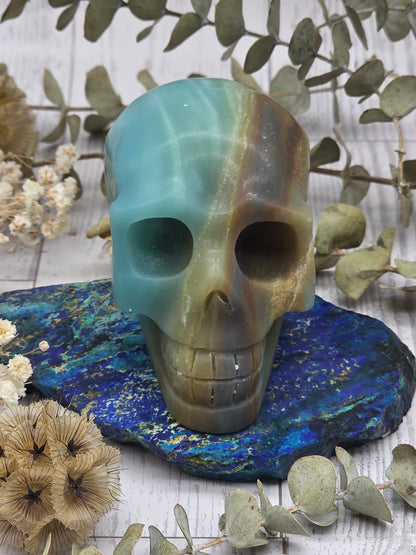 Amazonite skull with blue and brown hues