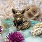 Brass fox figurine with a polished finish