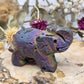 Aura sphalerite elephant carving with purple and hues
