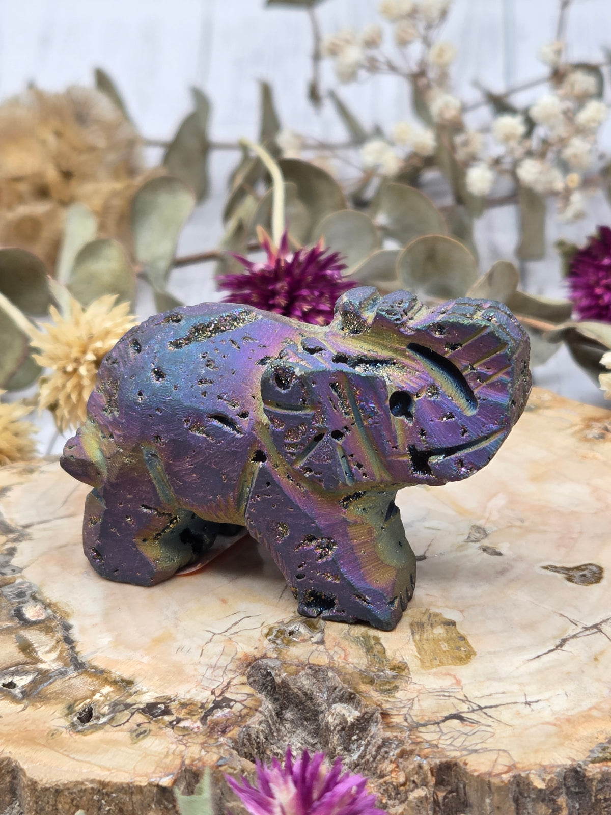 Aura sphalerite elephant carving with purple and hues