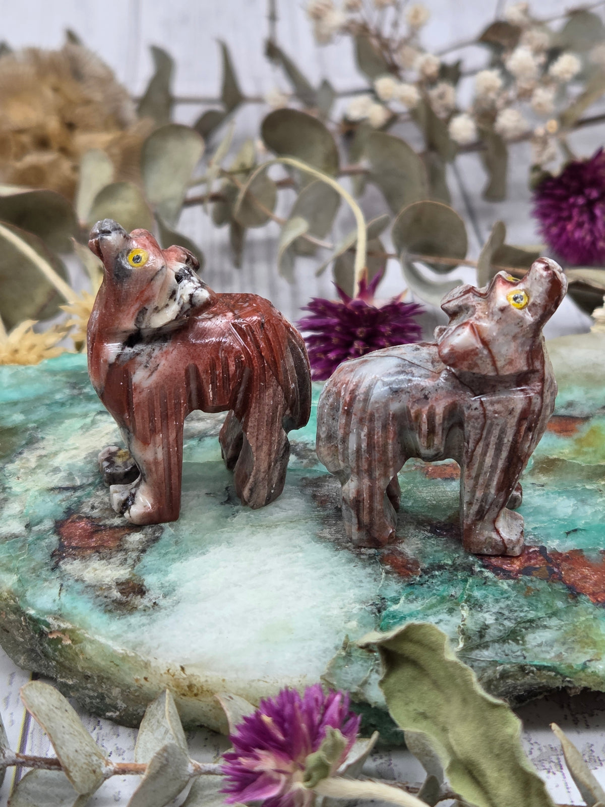 Soapstone wolf carving with brown and white patterns