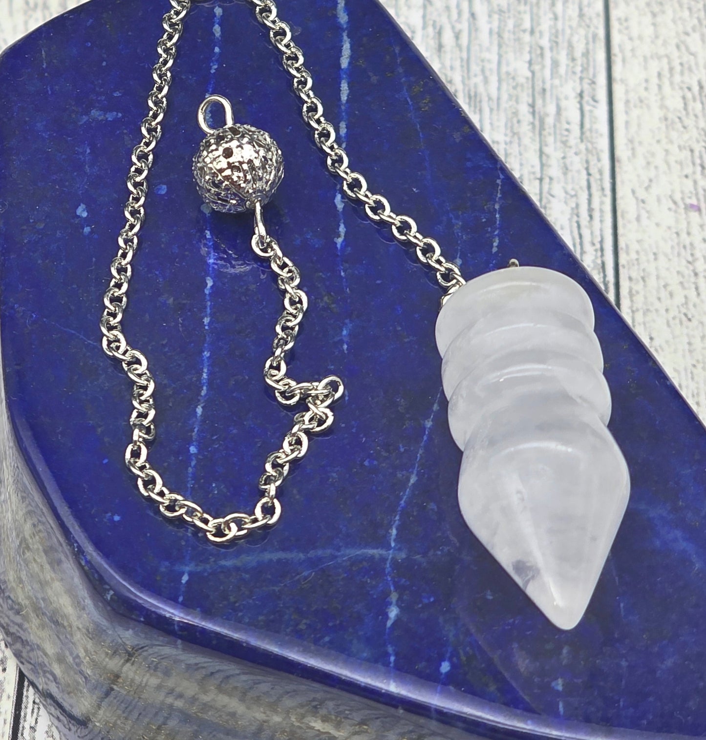 Carved Clear Quartz Pendulum