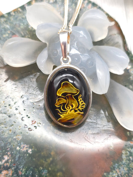 Hand-Carved Amber Pendant with Mushrooms