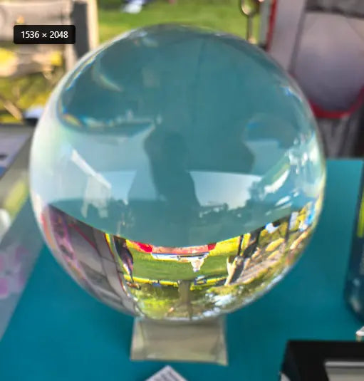 The July giveaway reconstituted clear quartz crystal sphere on its included stand